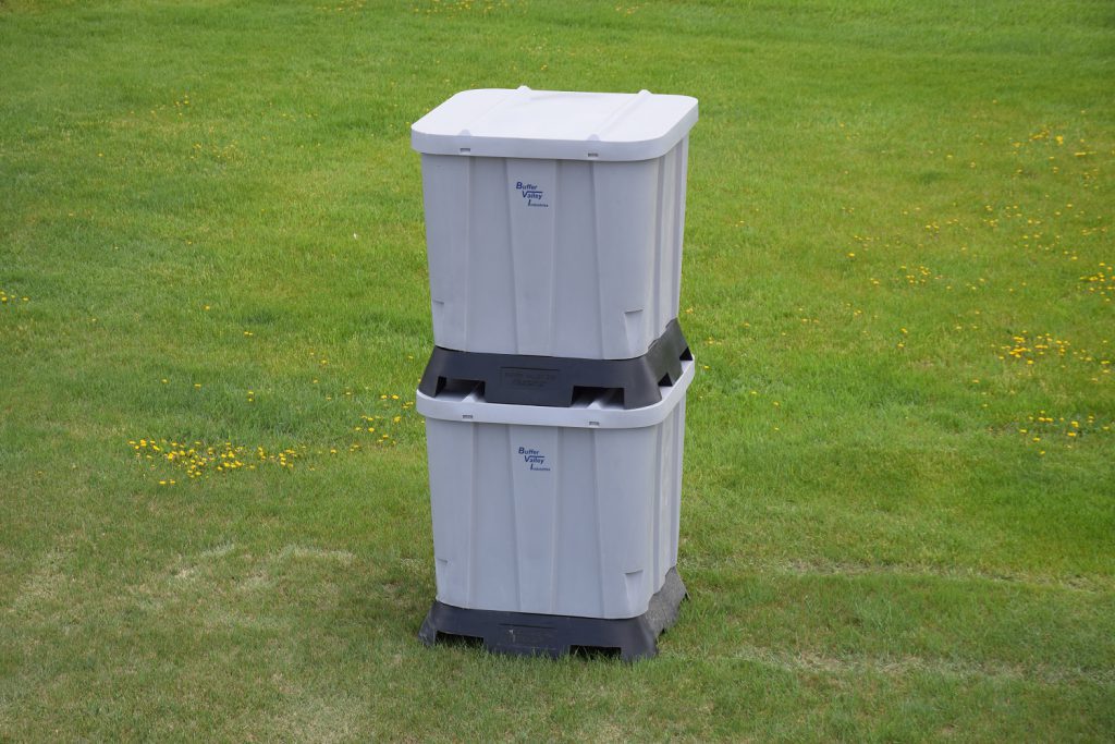 two 40 bushel pallet grain bins stacked for storage
