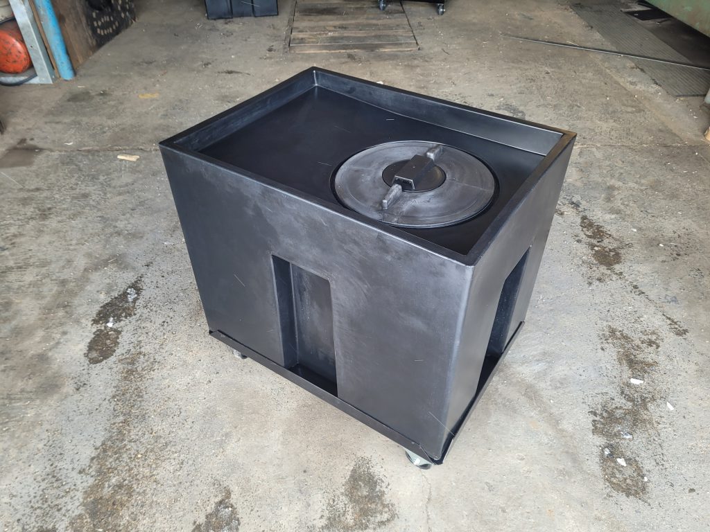 black plastic oil tank on cart with wheels